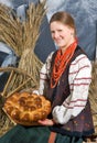 Homemade round bread in hands of girl