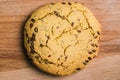 Homemade round cookies on a wooden table. Sweet pastries with grains close-up. Cooking at home Royalty Free Stock Photo