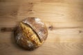 Homemade round loaf of freshly baked artisan sourdough bread Royalty Free Stock Photo