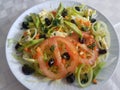 Homemade salad with raisins and avocado