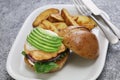 Homemade salmon burger with avocado Royalty Free Stock Photo