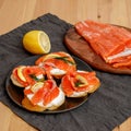 Homemade salted salmon toasts with creamcheese on plate