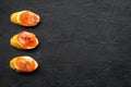 Homemade sandwiches with french baguette, salmon on black background top view mock-up