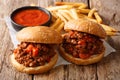 Homemade sandwiches with meat Sloppy Joe and french fries, ketch Royalty Free Stock Photo
