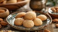 Homemade Sardinian amaretti biscuits on a rustic table with tea