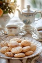 Homemade Sardinian Amaretti biscuits served with tea, cozy atmosphere