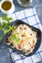 Homemade Sauerkraut with seasonings in an gray bowl. Natural Probiotics