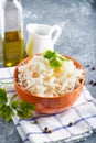 Homemade Sauerkraut with seasonings in an orange bowl. Natural Probiotics, Healthy Food