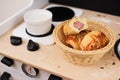 Homemade sausage rolls on toy kitchen for children play