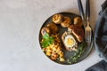 Homemade scotch eggs on a ceramic plate served with bulgur pilaf, grilled mushroom and aromatic herbs. Meat cutlet with boiled egg Royalty Free Stock Photo