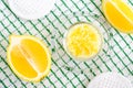 Homemade scrub foot soak or bath salt with lemon juice and zest, sea salt and olive oil. DIY beauty treatments and spa recipe.