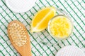 Homemade scrub foot soak or bath salt with lemon juice and zest, sea salt and olive oil. DIY beauty treatments and spa recipe.