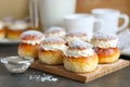 Homemade semla buns on the wooden desk