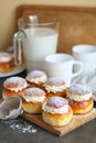 Homemade semla buns on the wooden desk