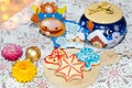 Homemade shaped cookies on the background of Christmas decorations. Selective focus Royalty Free Stock Photo