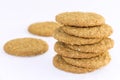 Homemade shortbread cookies made of oatmeal are stacked on a white table background. Food snack concept and with copy space for Royalty Free Stock Photo