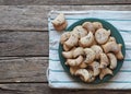 Homemade shortbread cookies sprinkled with sugar with black sesame seeds on a wooden rustic table. Tea party with cookies and Royalty Free Stock Photo