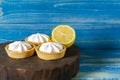 Homemade shortbread mini tart cakes with lemon curd and whipped cream,white grey concrete background copy space Royalty Free Stock Photo