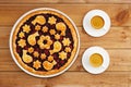 Homemade shortcrust cherry pie and two white cups of coffee espresso on wooden table. Royalty Free Stock Photo