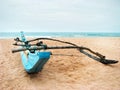Homemade Single Outrigger Canoe on Sandy Beach - Summer active s