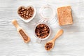 Homemade skin care. Coffee soap, coffee scrub, coffee grains on wooden background top view Royalty Free Stock Photo