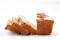 Homemade sliced muffin on white background, closeup