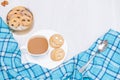 Homemade smile cookies with cup of coffee on white wooden background. Good morning or have a nice day concept. Flat lay, copy Royalty Free Stock Photo