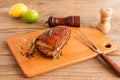 Homemade Smoked Barbecue Beef Brisket on wooden cutting board before cutting Royalty Free Stock Photo