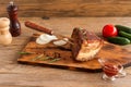 Homemade Smoked Barbecue Beef Brisket on wooden cutting board before cutting Royalty Free Stock Photo