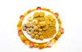 Homemade snacks with flowers kept with rangoli Royalty Free Stock Photo