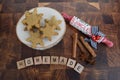 Homemade snowflake cookies with mini festive roller.