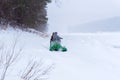 Homemade snowmobile on the ice of a winter river