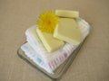 Homemade solid body butter bars with dandelion flower oil Royalty Free Stock Photo