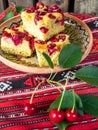 homemade sour cherry sponge cake slices on a traditional setup