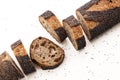 Homemade sourdough black bread baguette on white beackground. Food, baking Royalty Free Stock Photo