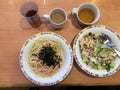 homemade spaghetti with dry seaweed dish and fried mixed vegetables with chicken on plastic plate Royalty Free Stock Photo