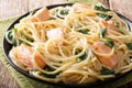 Homemade spaghetti with salmon, cream cheese and spinach closeup Royalty Free Stock Photo