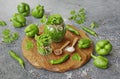 Homemade spicy green chili sauce in a glass jar