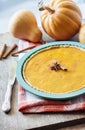 Homemade spicy pumpkin pie with cinnamon in silicone bakeware