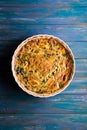 Homemade spinach french pie quiche lorraine on wooden board Royalty Free Stock Photo