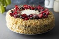 Homemade sponge cake with cream and fresh berries. Carrot and orange cake, decorated with berry. sweet dessert. Whole deliciouse Royalty Free Stock Photo