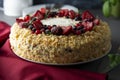 Homemade sponge cake with cream and fresh berries. Carrot and orange cake, decorated with berry. sweet dessert. Whole deliciouse Royalty Free Stock Photo