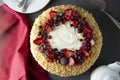 Homemade sponge cake with cream and fresh berries. Carrot and orange cake, decorated with berry. sweet dessert. Whole deliciouse