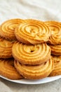 Homemade Sprits Biscuits on a Plate, side view. Close-up