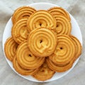 Homemade Sprits Biscuits on a Plate, top view. Flat lay, overhead, from above. Close-up