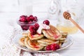 Homemade stack of pancakes with cherries for tasty healthy breakfast Royalty Free Stock Photo