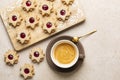 Homemade star or flower shaped linzer cookies with raspberry jam Royalty Free Stock Photo