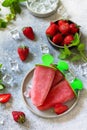 Homemade strawberry frozen fruit juice. Ice cream or popsicles. Royalty Free Stock Photo