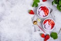 Strawberry ice cream in white bowl