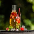 Homemade strawberry ice tea in the garden Royalty Free Stock Photo